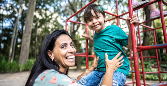 Mother and son on a playground.